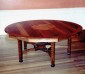 Redwood table made of several grain types: curly, vertical and burl.