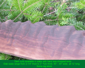 Dark curly slab with axe-chopped end