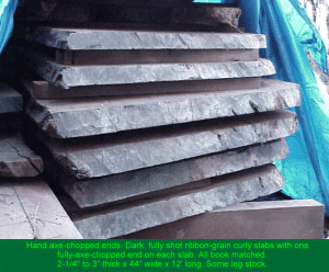 Dark fully shot ribbon-grain curly slabs