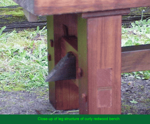 Leg structure of curly redwood bench